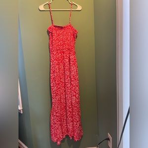 Pacific vibe ladies sundress red with white flowers. Adjustable straps